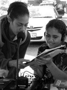 Young women on the radio with femTALK 89.2FM. Photo from femLINKPACIFIC.